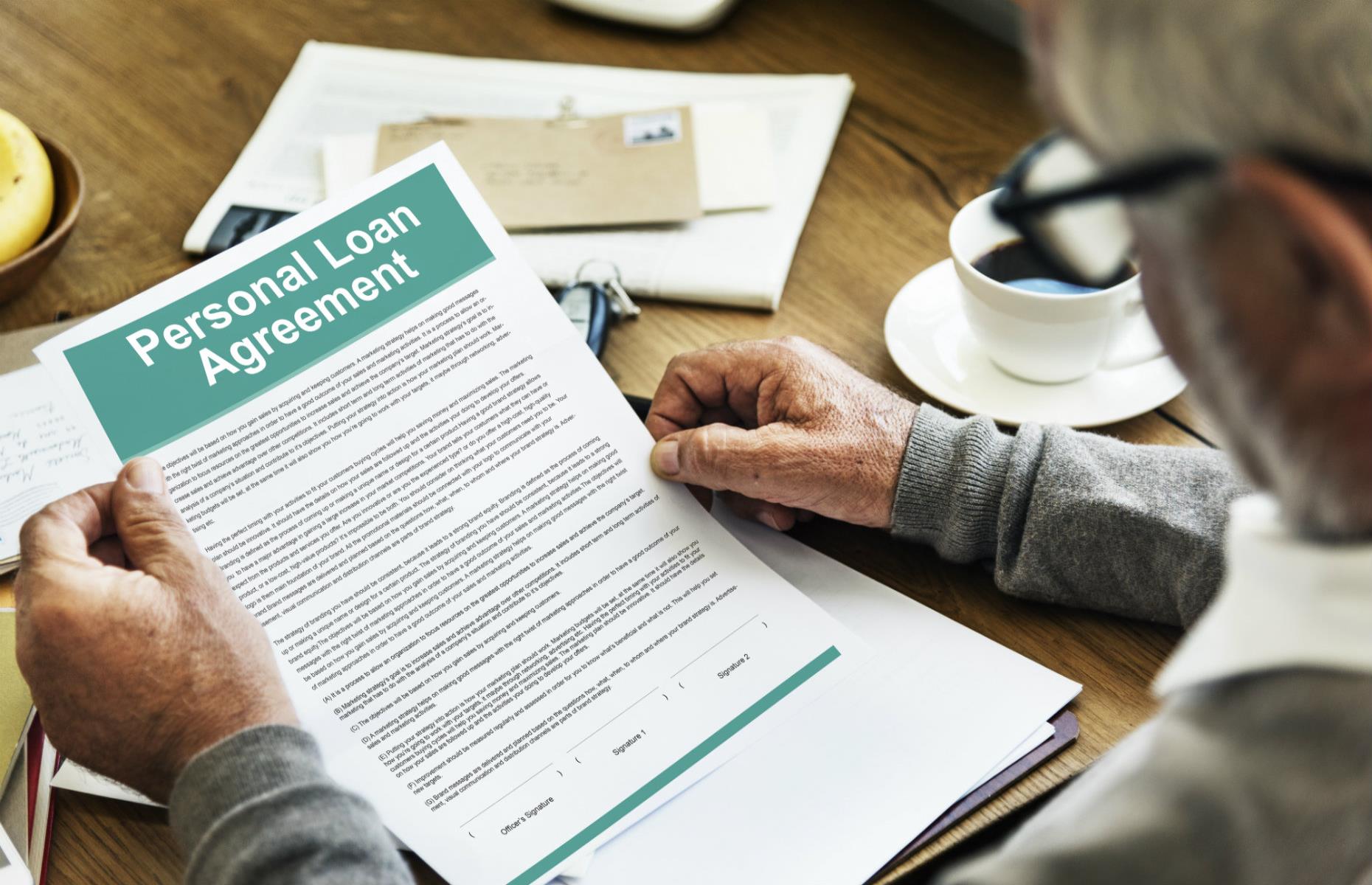 Man reviewing personal agreement
